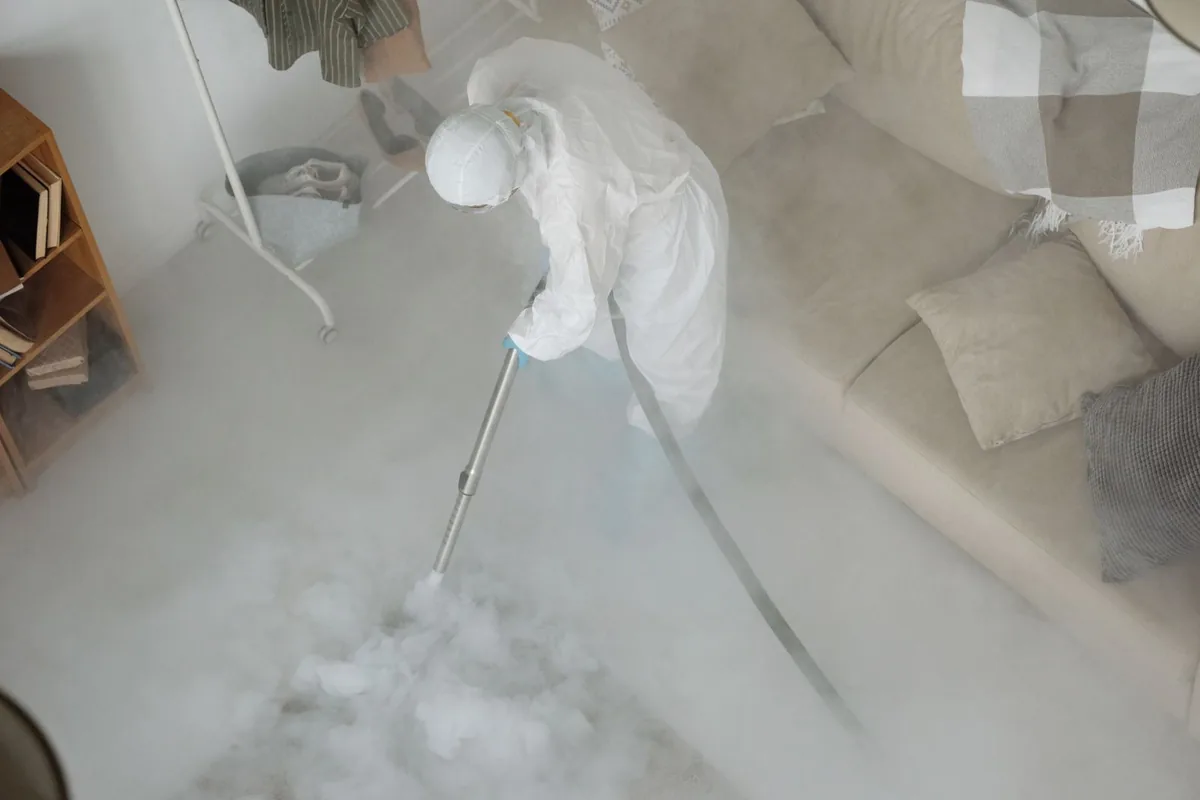 Biohazard cleanup technician in protective equipment, Irvine, CA